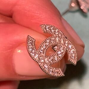 Absolutely stunning CC silver brand new  studs earrings with sparkly crystals .